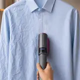 Défroissage vapeur sur cintre